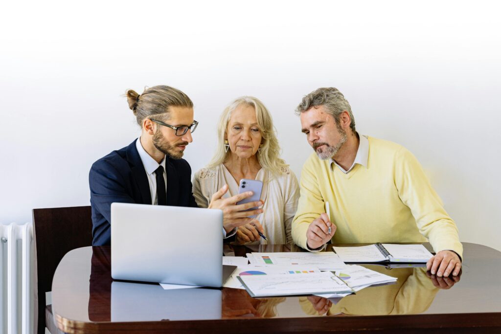 A public adjuster explains to a couple the process of insurance claims during a natural disaster in Florida.